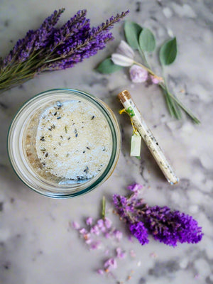 Lavender and Sage Bathsalts in jar and test tube on kitchen counter